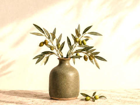 The vase photograph with increased overall exposure and brighter highlights